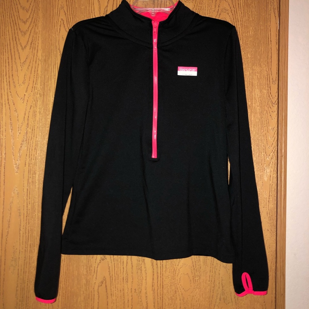 PINK pullover.